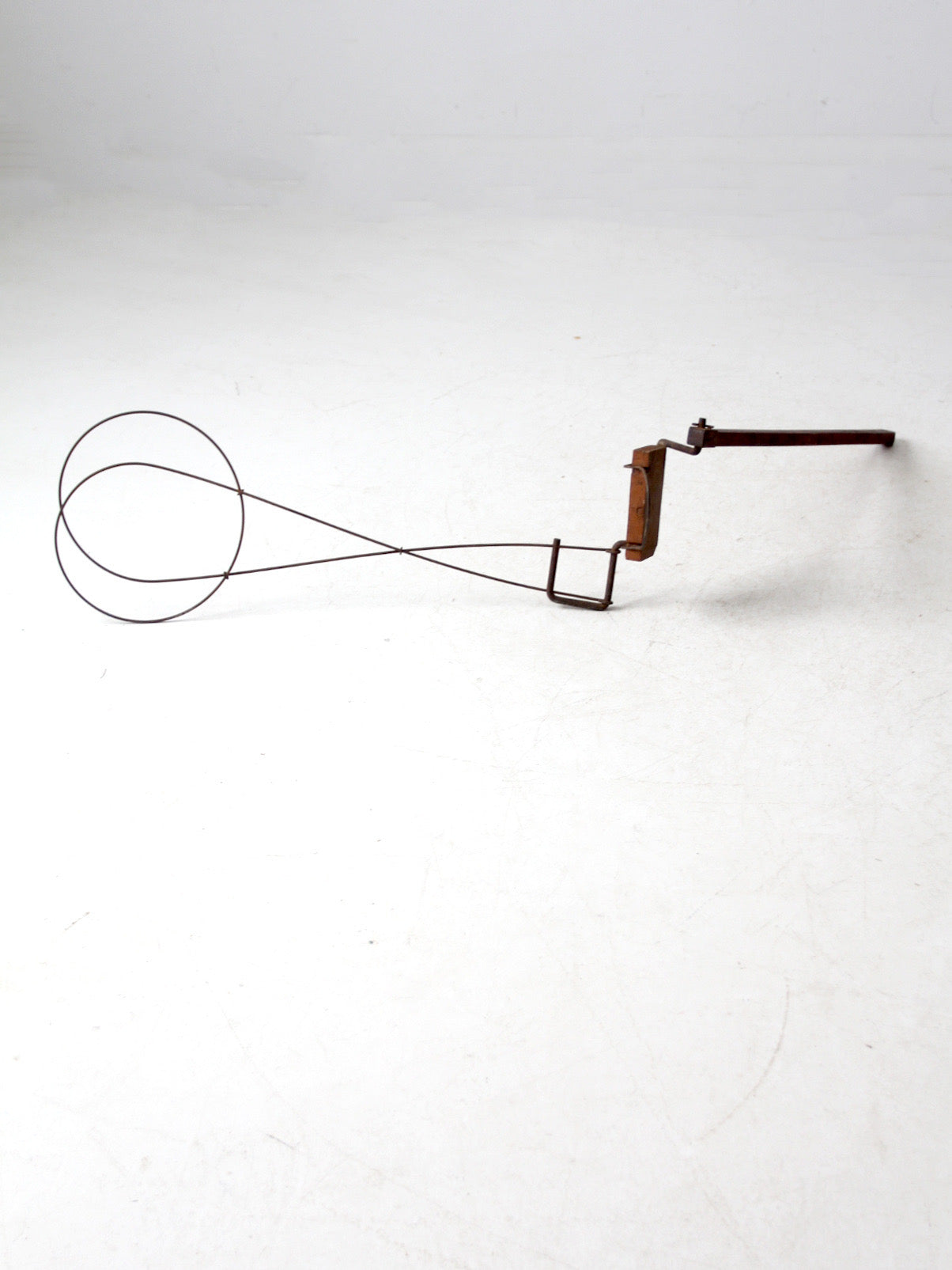 antique Cyclone Go-ZY rug beater by Wrightman Co.