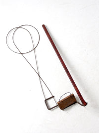 antique Cyclone Go-ZY rug beater by Wrightman Co.