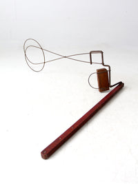 antique Cyclone Go-ZY rug beater by Wrightman Co.