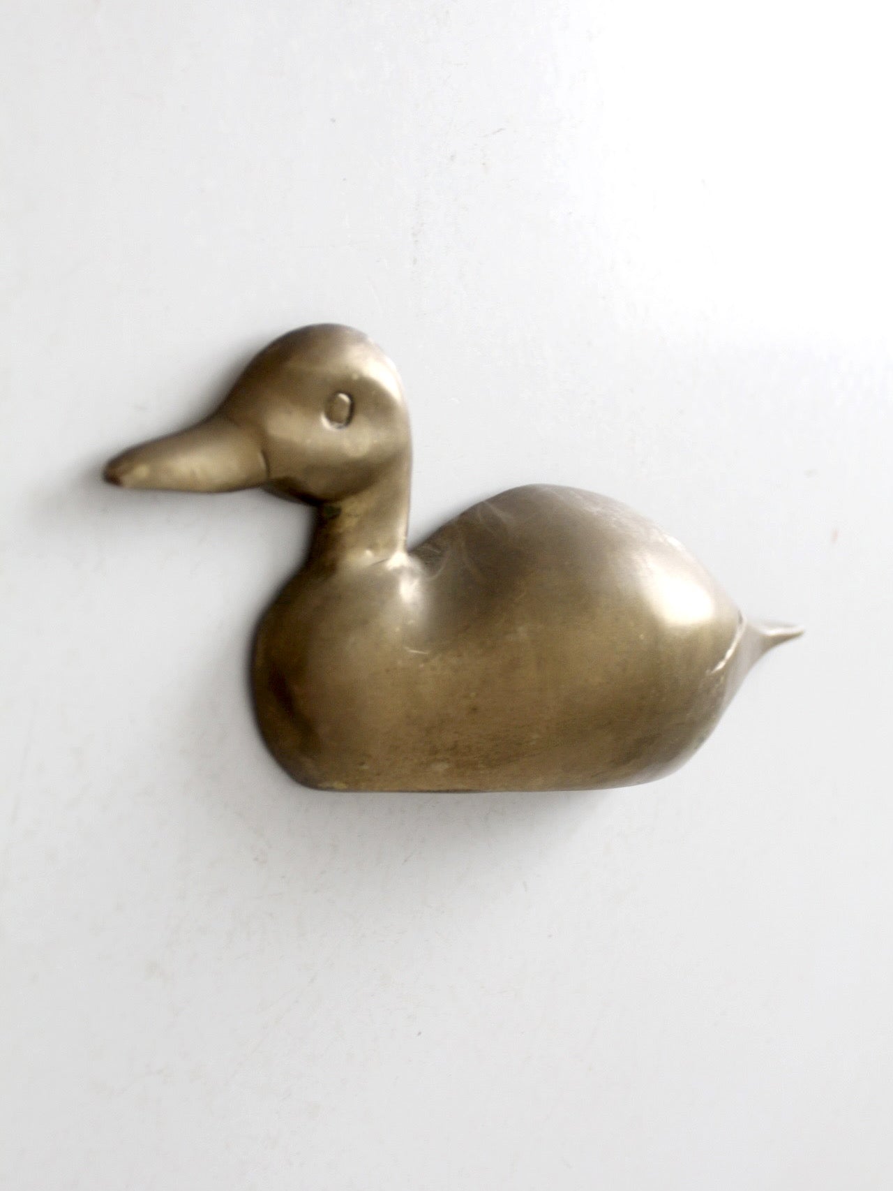 vintage brass duck wall hanging