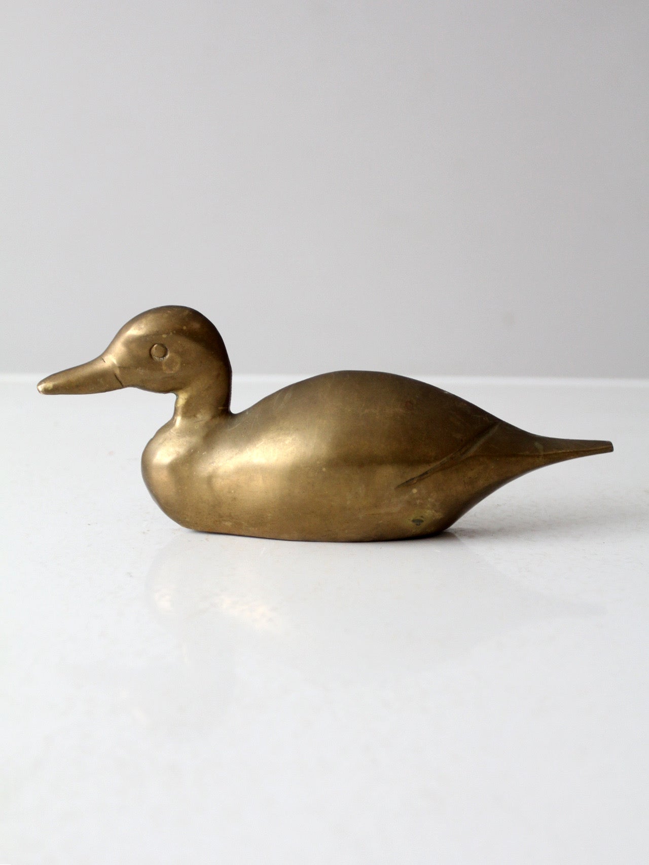 vintage brass duck wall hanging