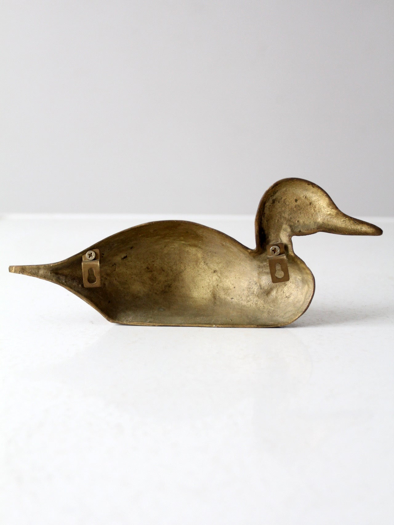 vintage brass duck wall hanging