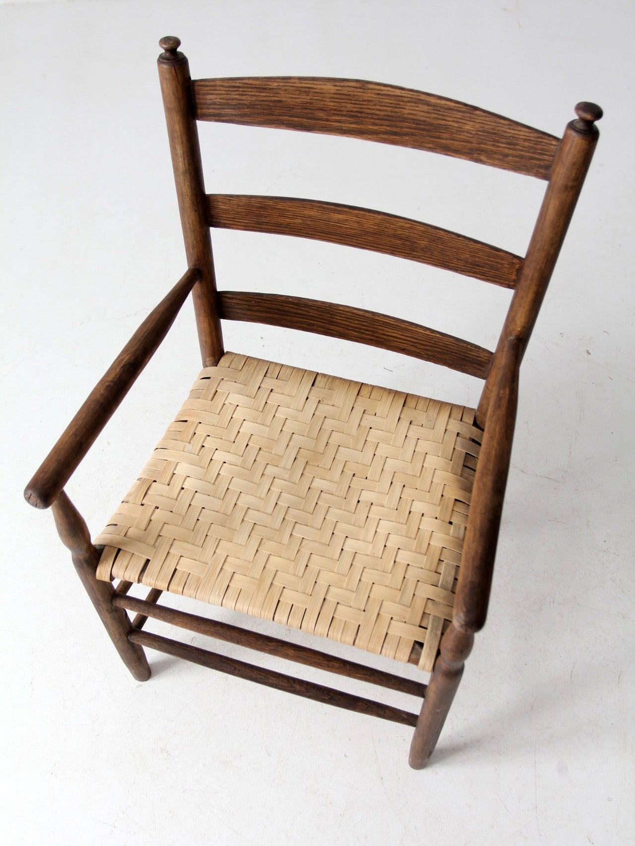 antique woven seat armchair