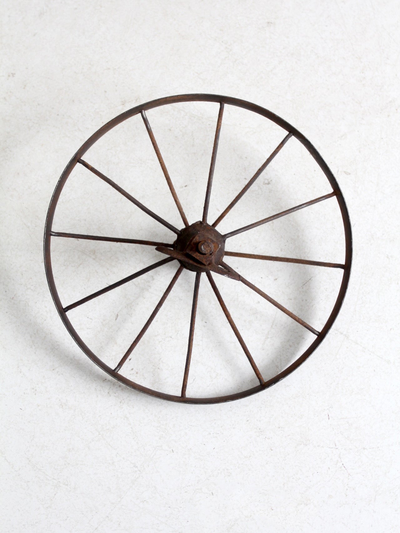 antique iron cart wheel
