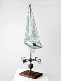 antique nautical weathervane on stand
