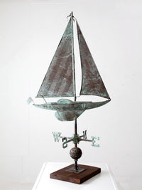 antique nautical weathervane on stand