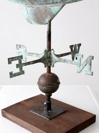 antique nautical weathervane on stand