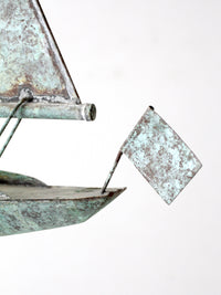 antique nautical weathervane on stand