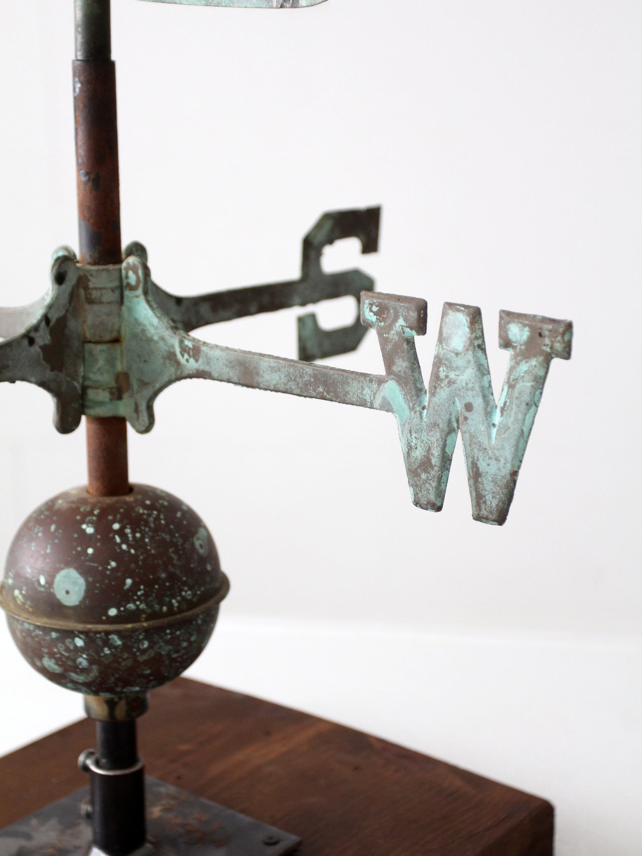 antique nautical weathervane on stand