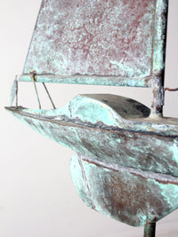 antique nautical weathervane on stand