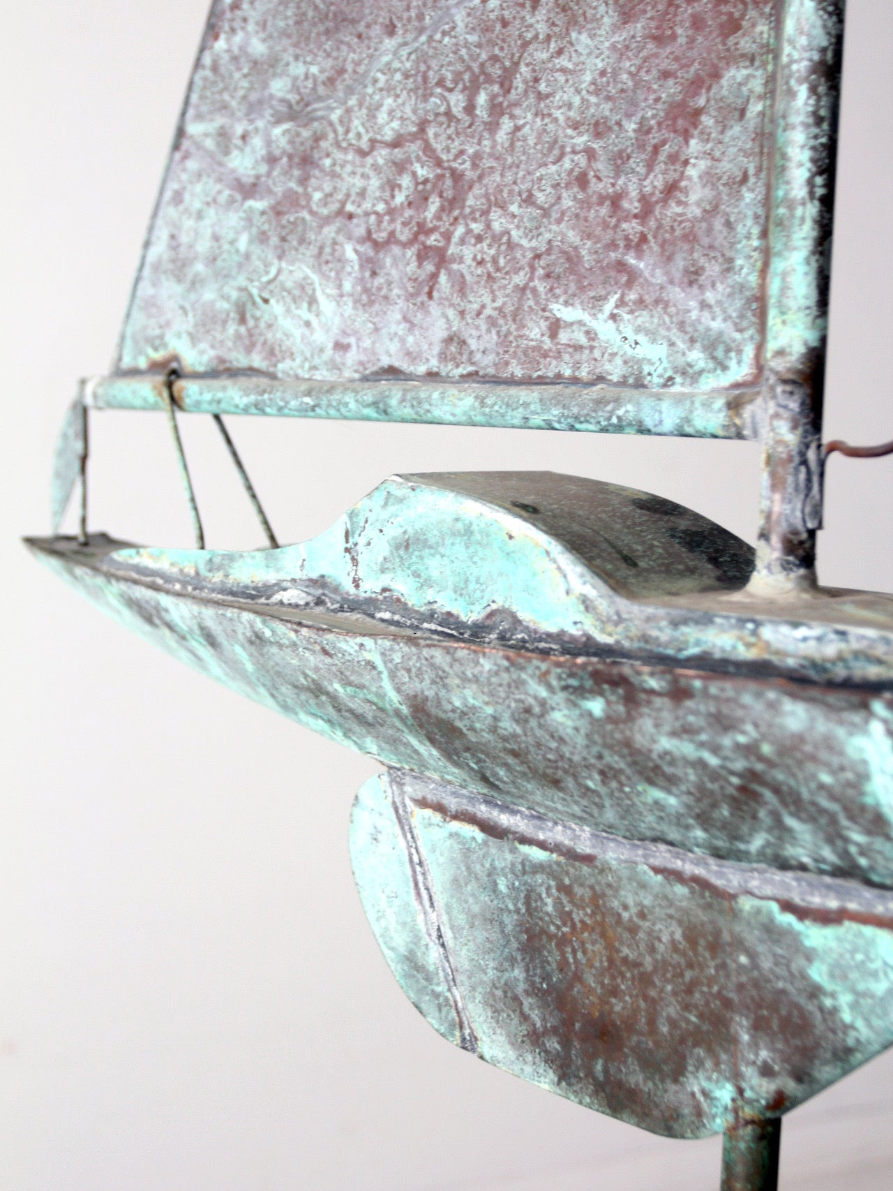 antique nautical weathervane on stand