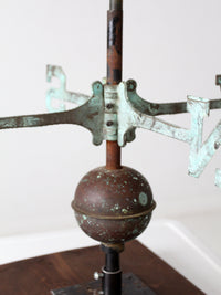 antique nautical weathervane on stand