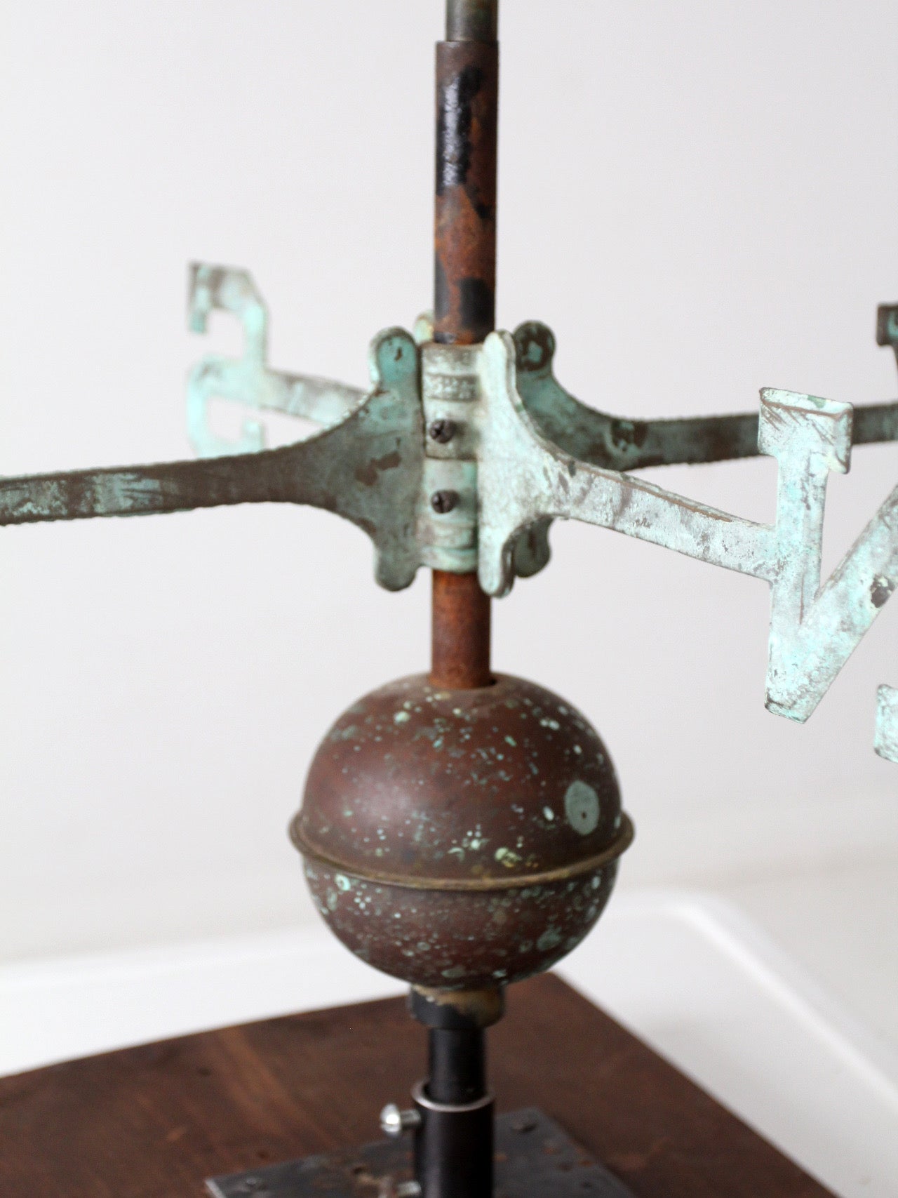 antique nautical weathervane on stand