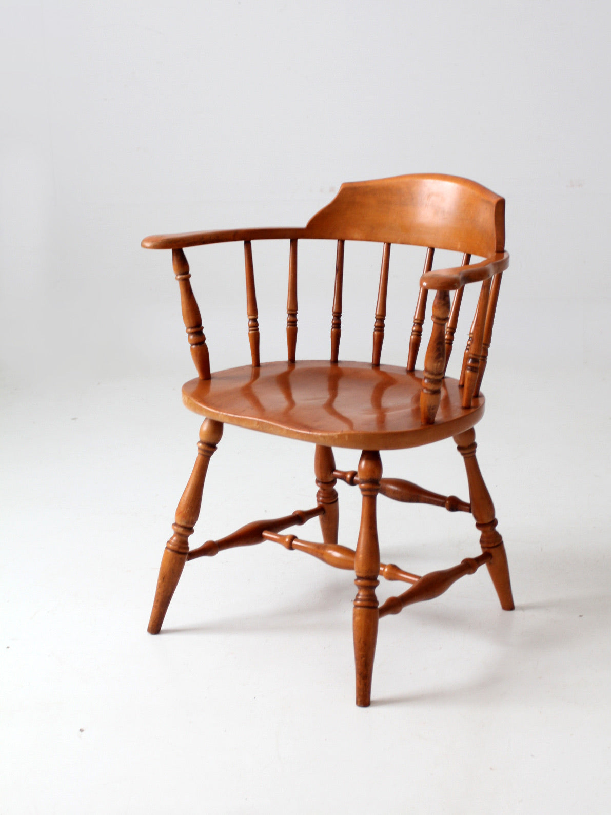 antique low back Windsor arm chair