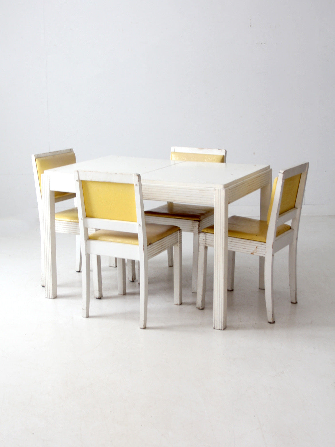 mid-century dining table and chairs set