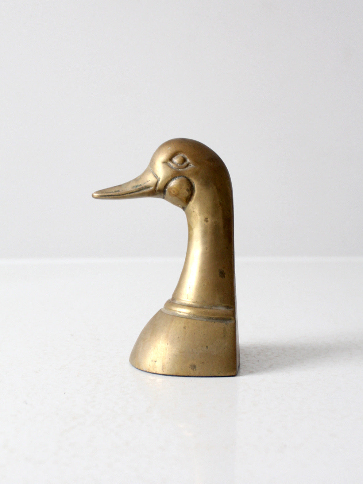 mid-century brass duck bookend