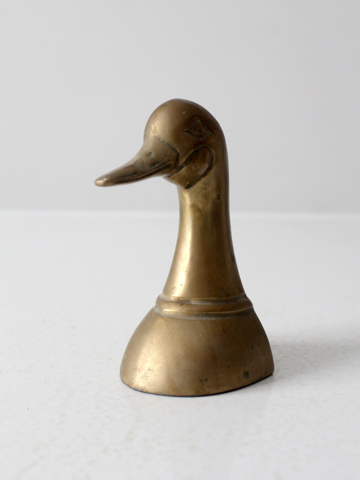 mid-century brass duck bookend