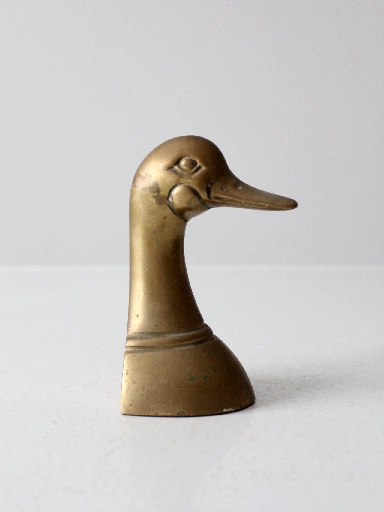 mid-century brass duck bookend