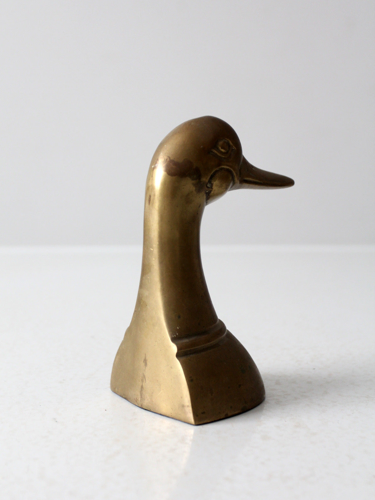 mid-century brass duck bookend