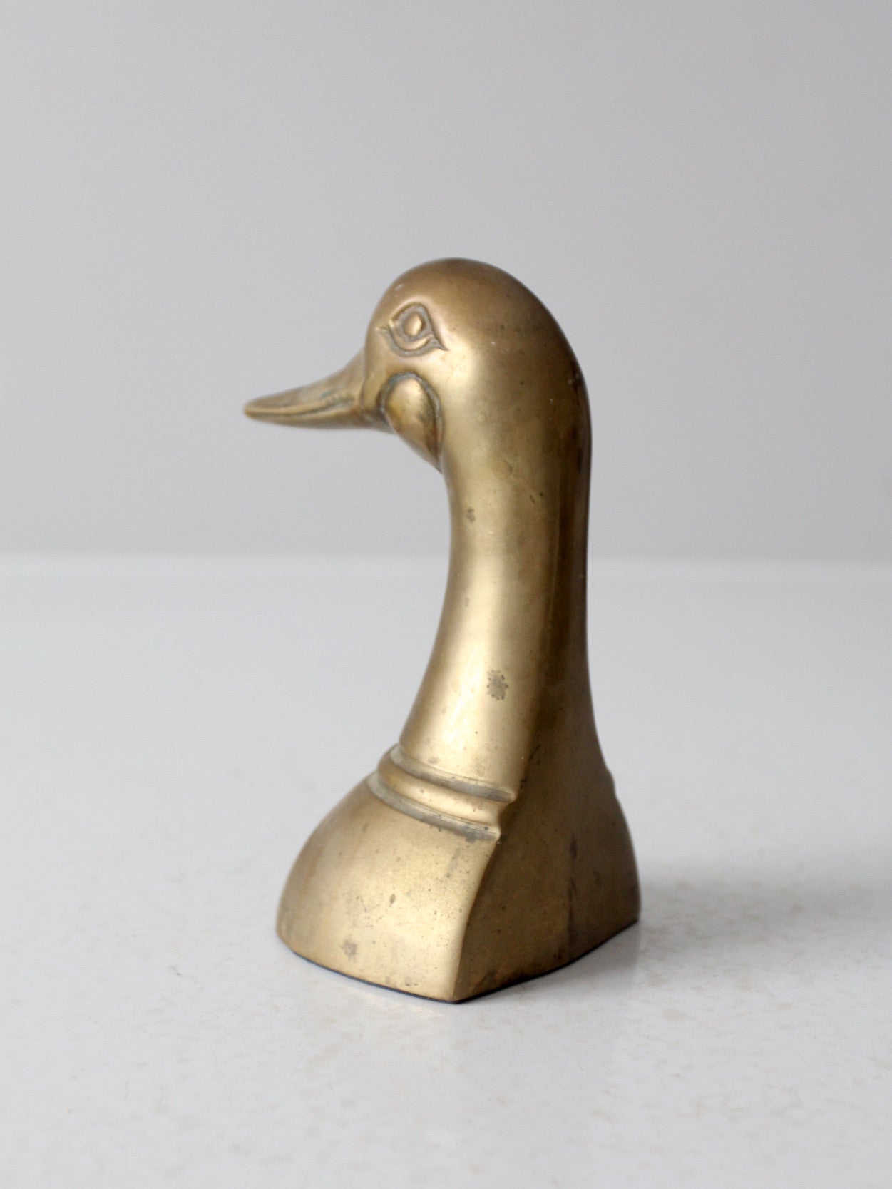 mid-century brass duck bookend