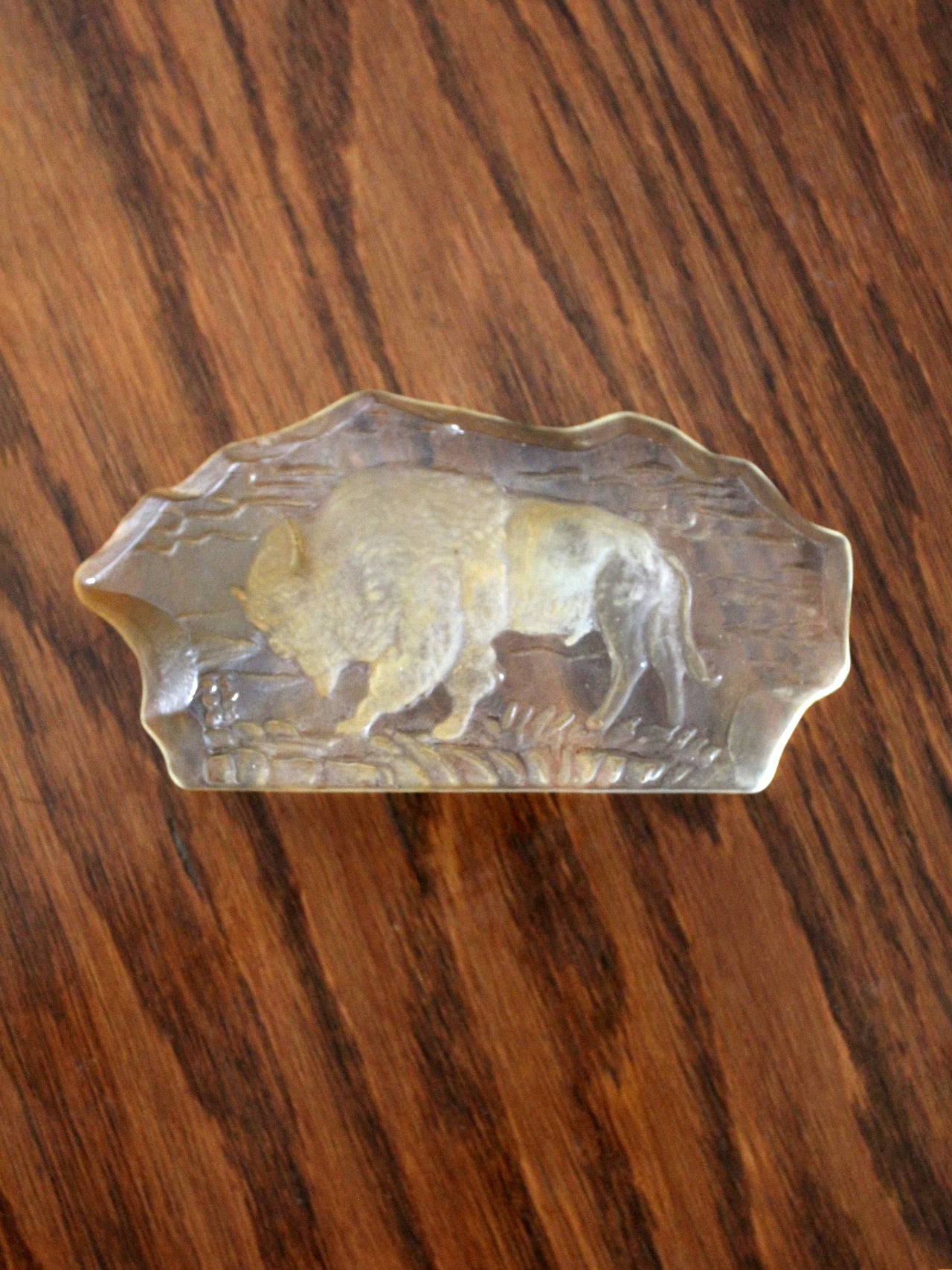vintage resin paperweight with grazing bison
