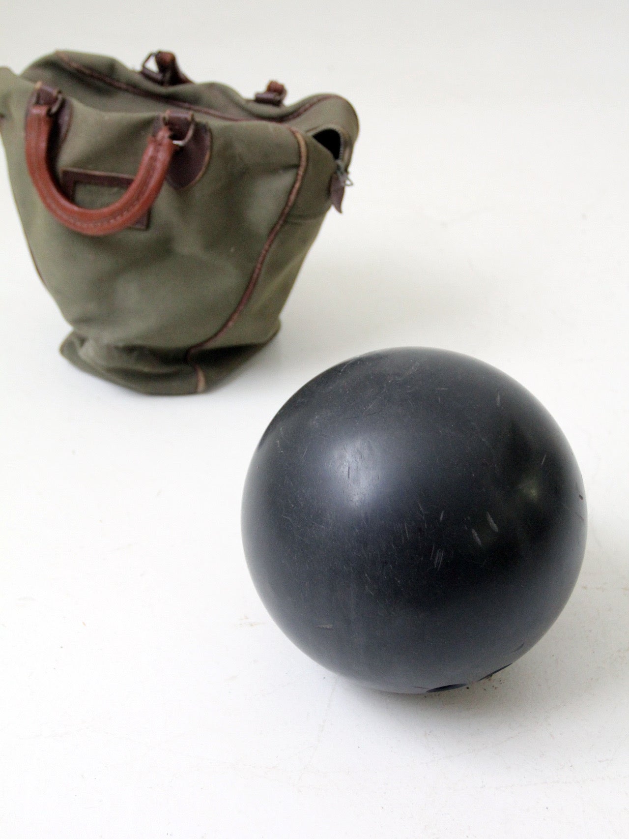 mid-century Ebonite 16 lb bowling ball with bag