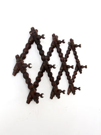 antique Victorian accordion wall rack