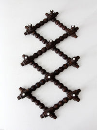 antique Victorian accordion wall rack