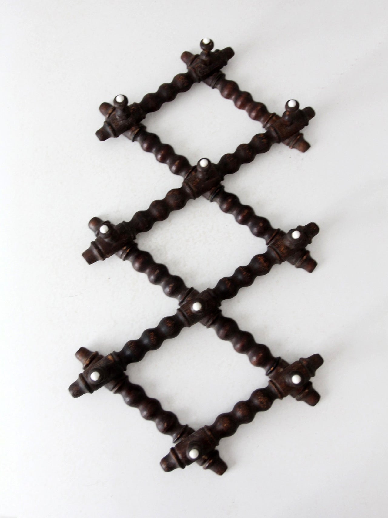 antique Victorian accordion wall rack