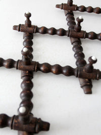 antique Victorian accordion wall rack