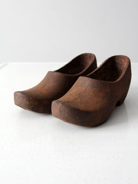 vintage cast iron decorative clogs