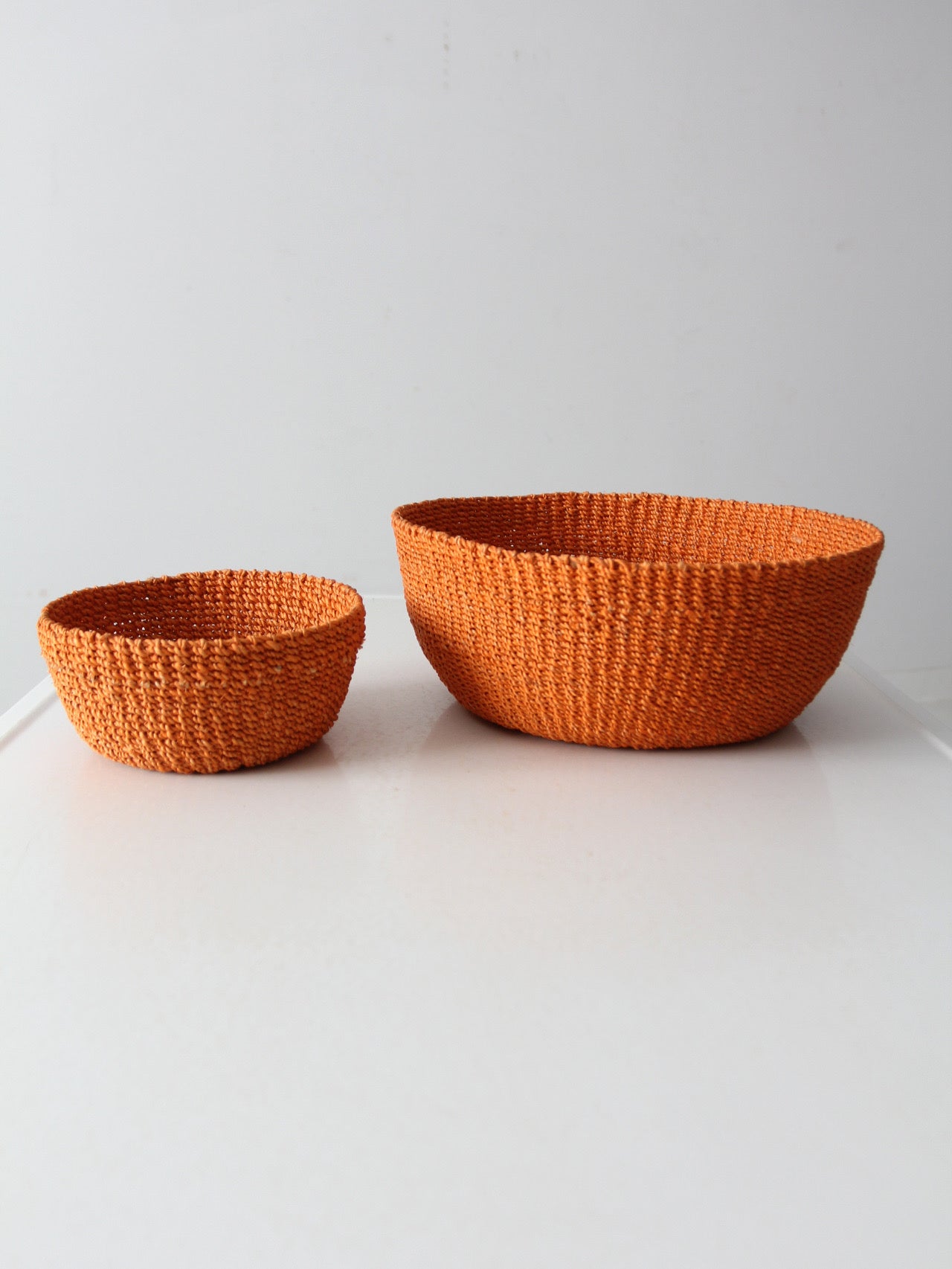 set of 2 vintage woven baskets
