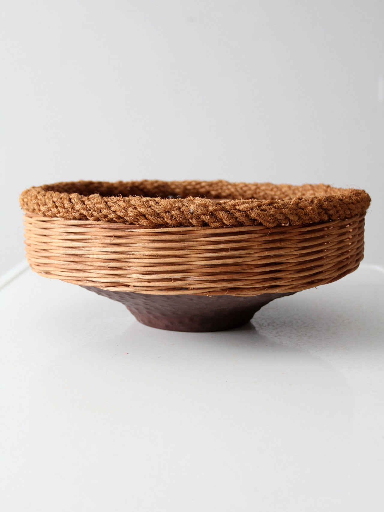 vintage copper and wicker bowl