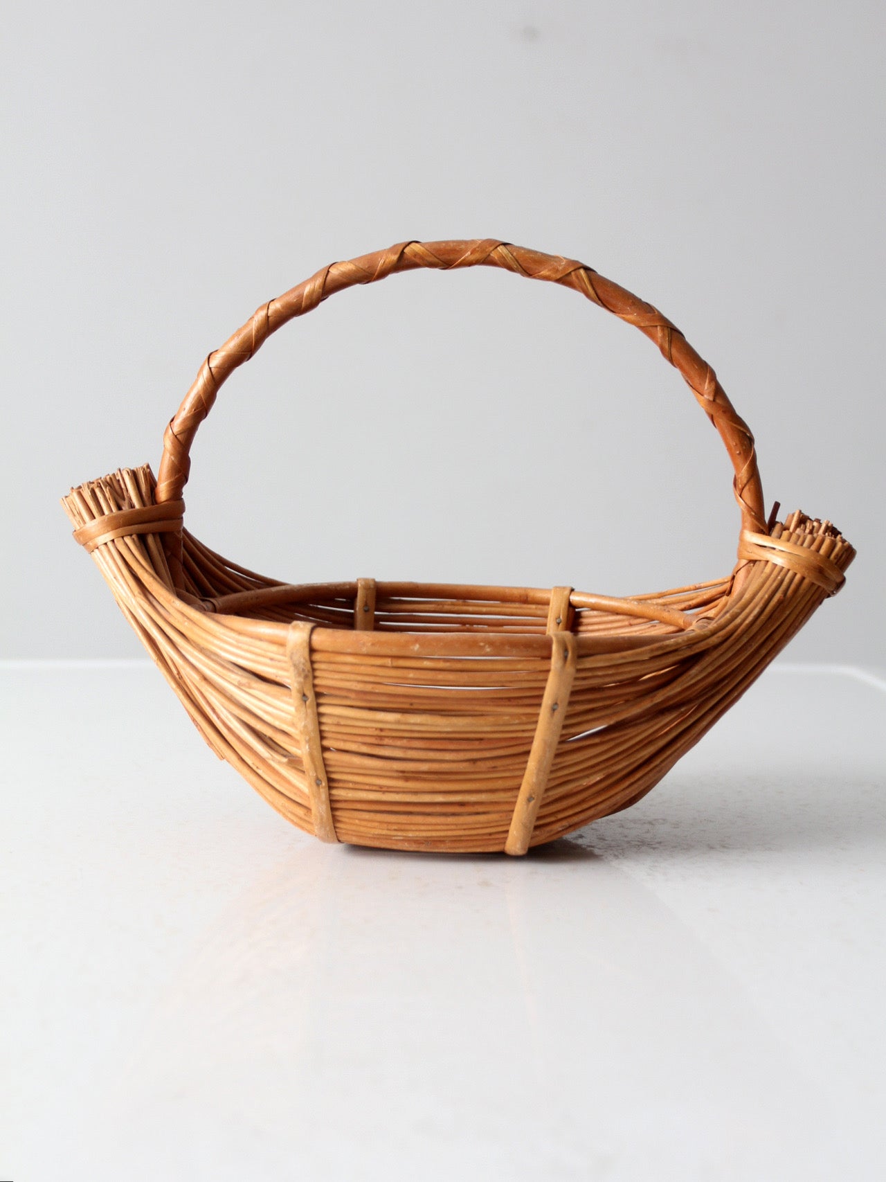 vintage rattan boat shaped basket