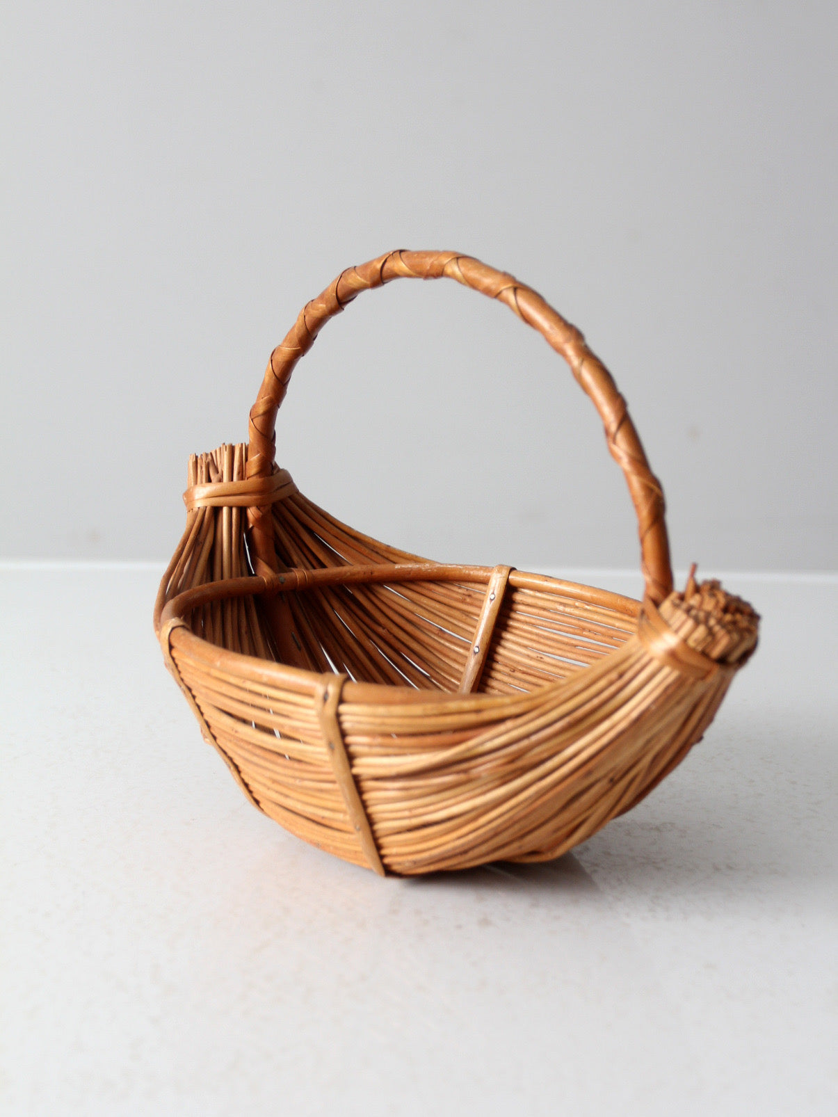 vintage rattan boat shaped basket
