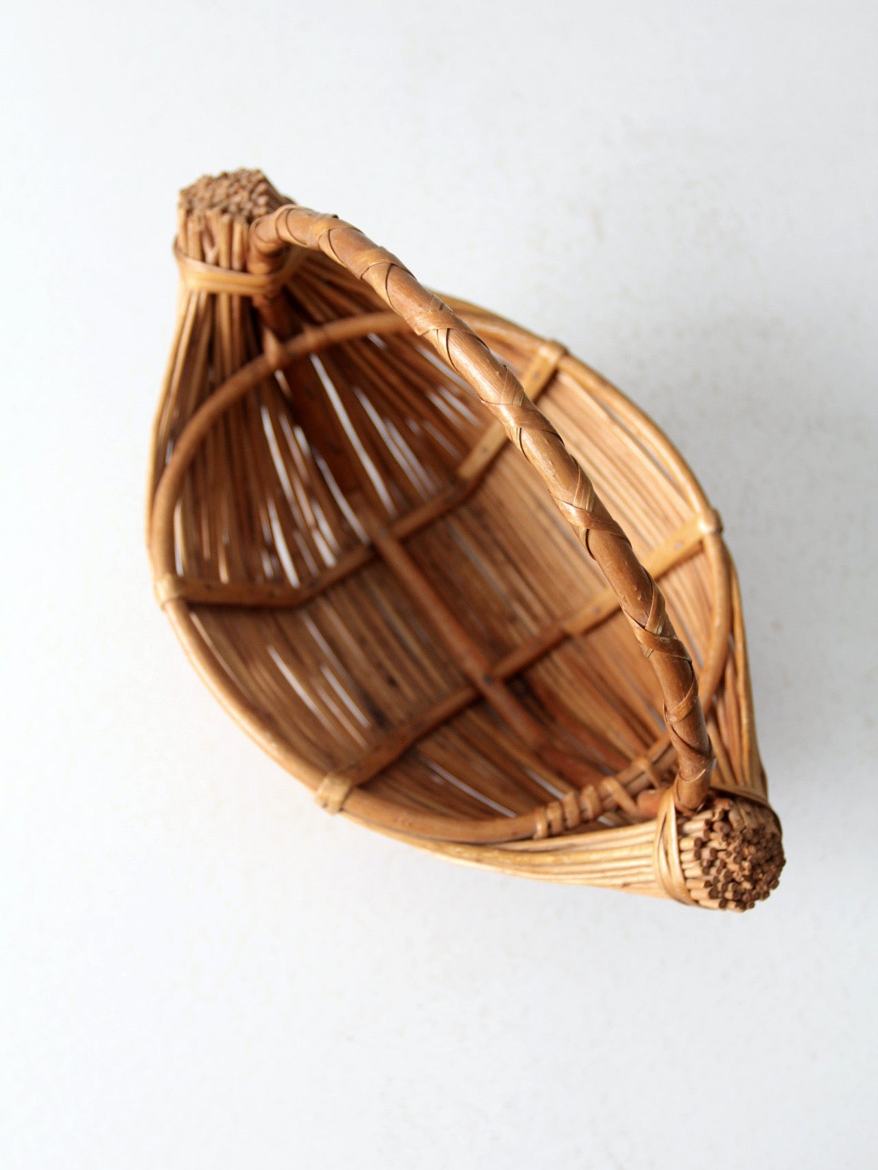 vintage rattan boat shaped basket