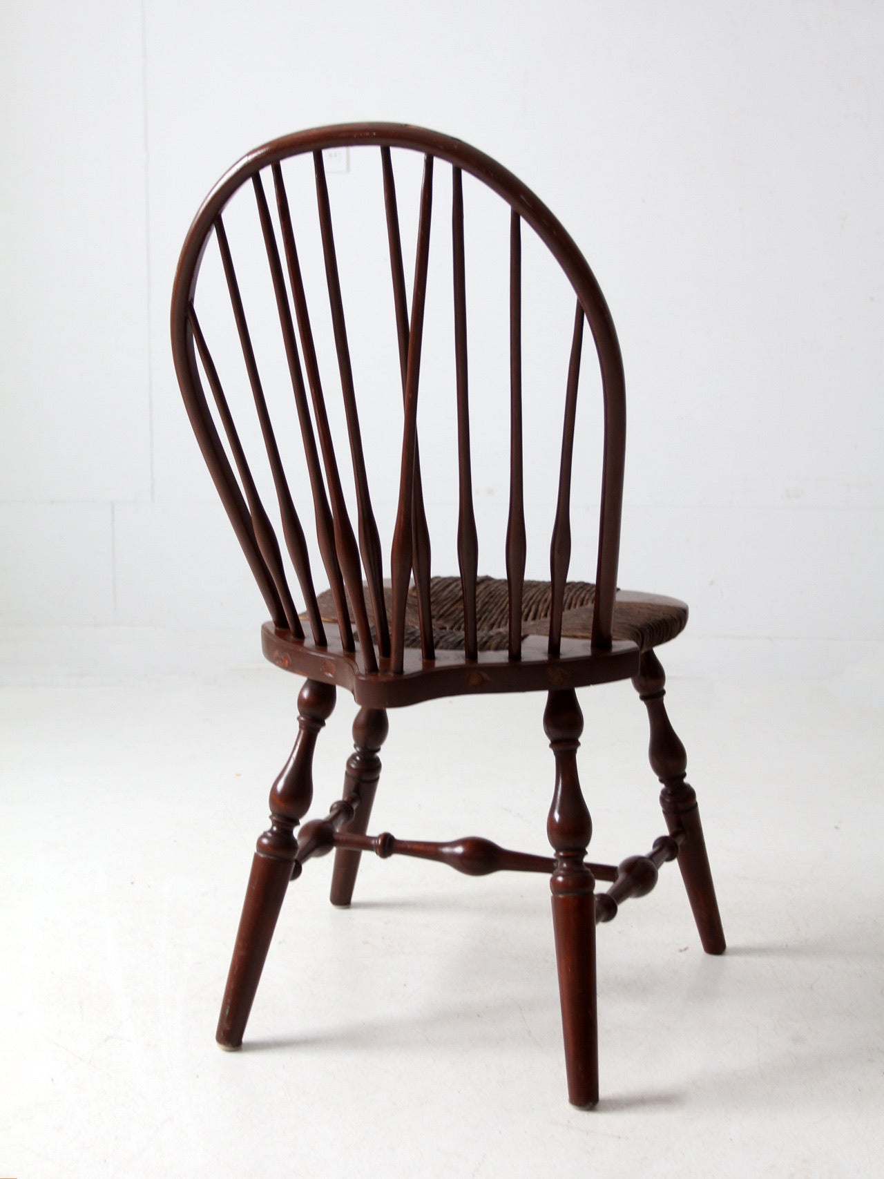 antique brace back Windsor chair with rush seat