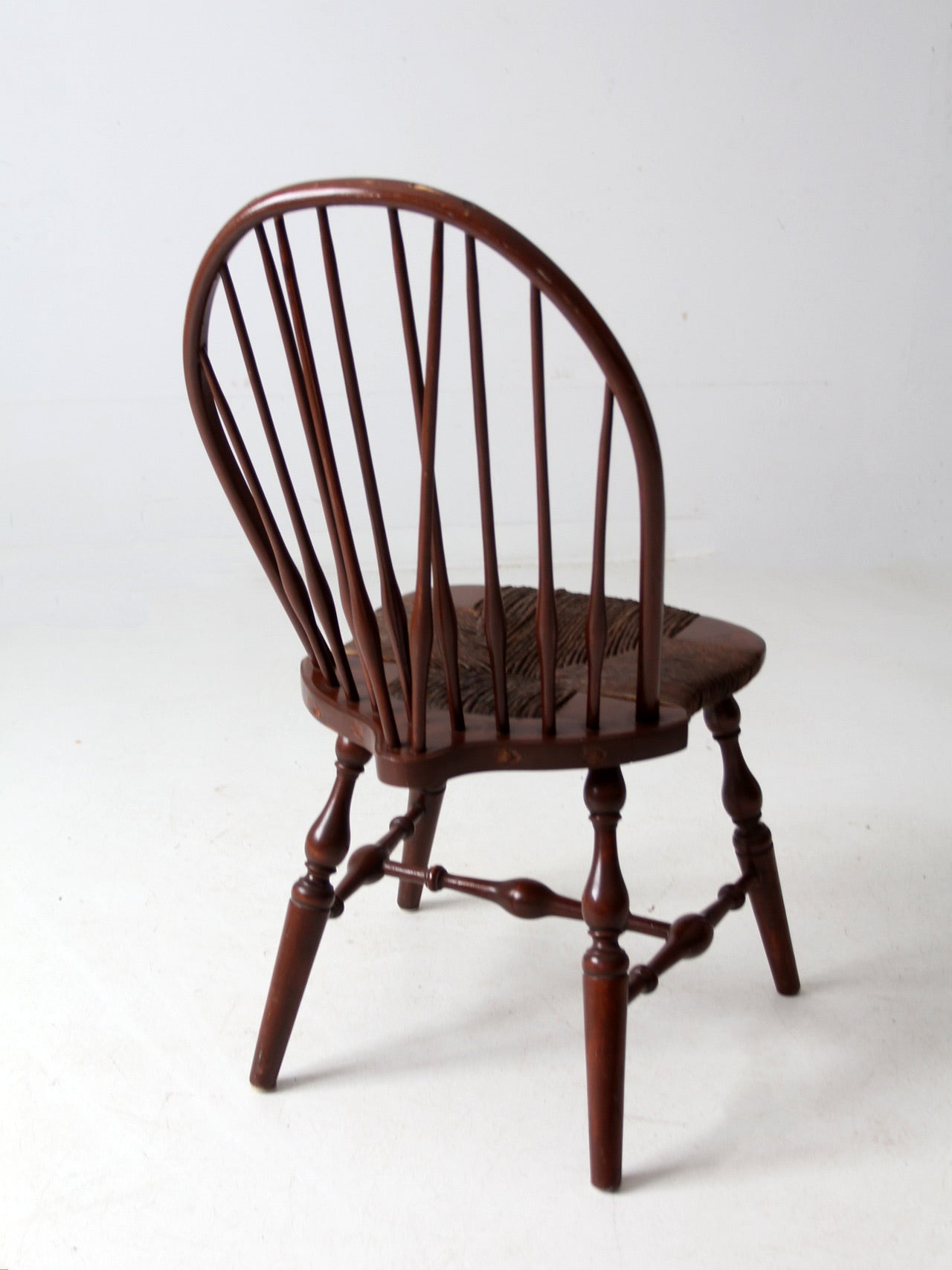 antique brace back Windsor chair with rush seat