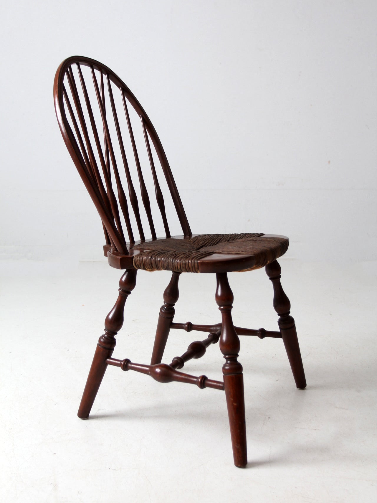 antique brace back Windsor chair with rush seat