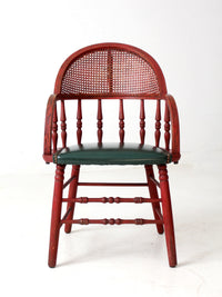 antique red Windsor cane back arm chair with upholstered seat