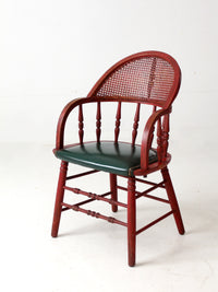 antique red Windsor cane back arm chair with upholstered seat