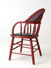 antique red Windsor cane back arm chair with upholstered seat