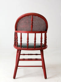 antique red Windsor cane back arm chair with upholstered seat
