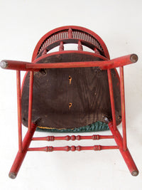 antique red Windsor cane back arm chair with upholstered seat