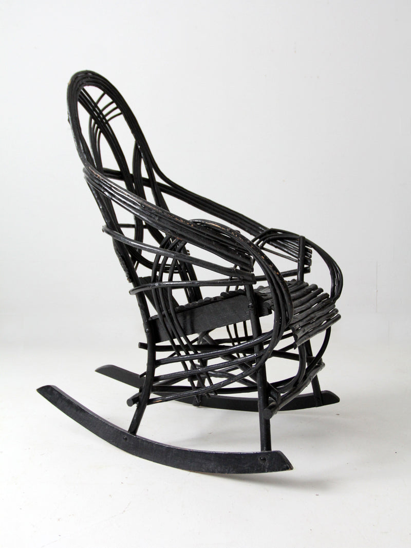 antique black Adirondack rocking chair