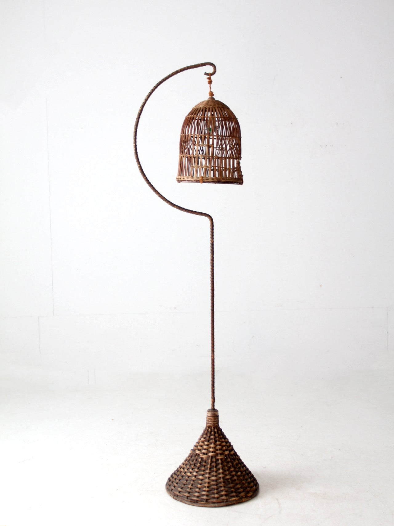 antique wicker bird cage and stand