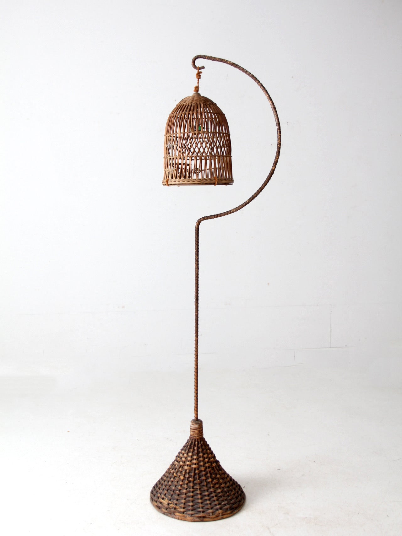 antique wicker bird cage and stand