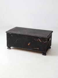antique black woven canvas trunk