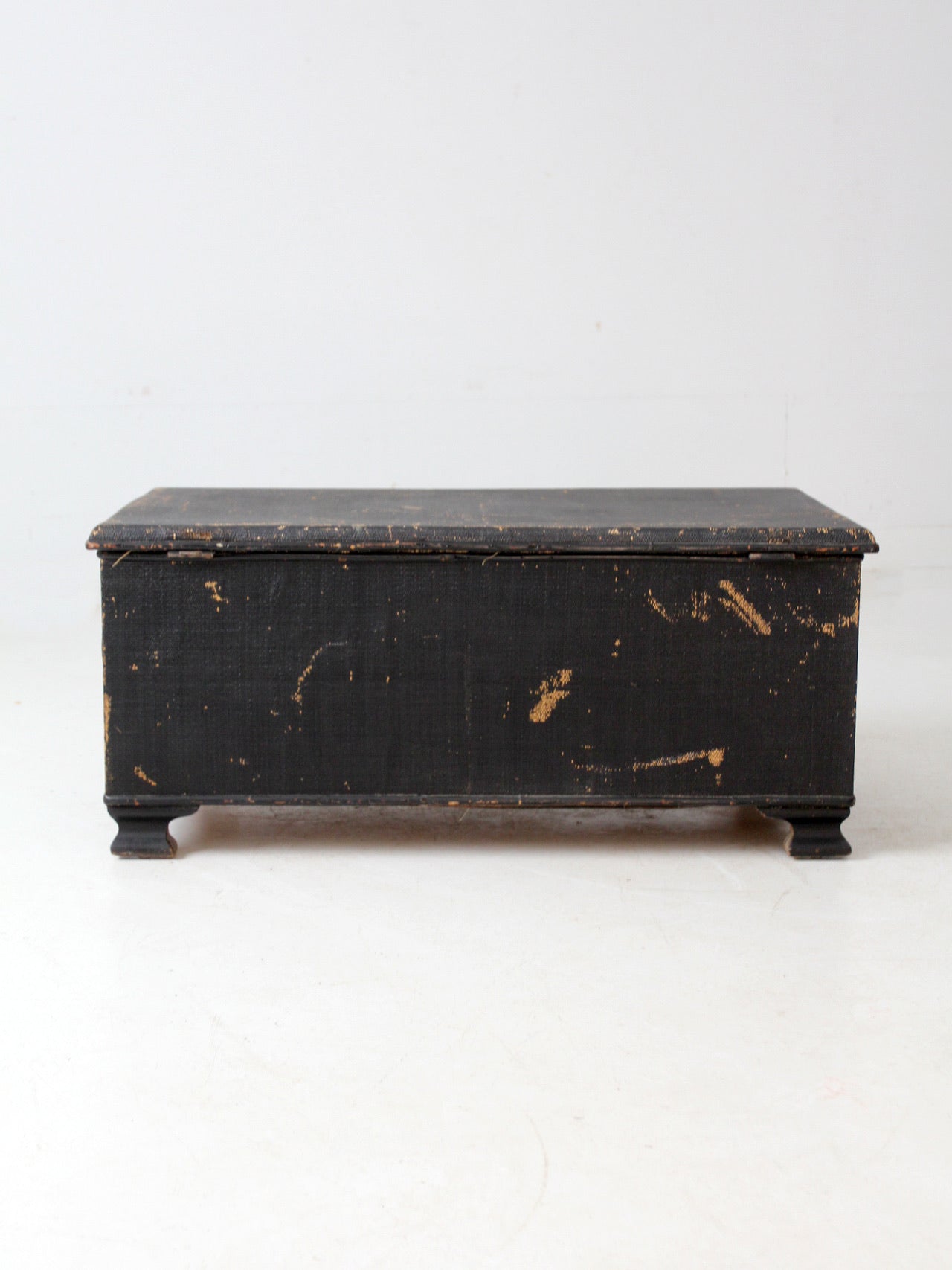 antique black woven canvas trunk