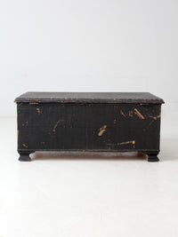 antique black woven canvas trunk